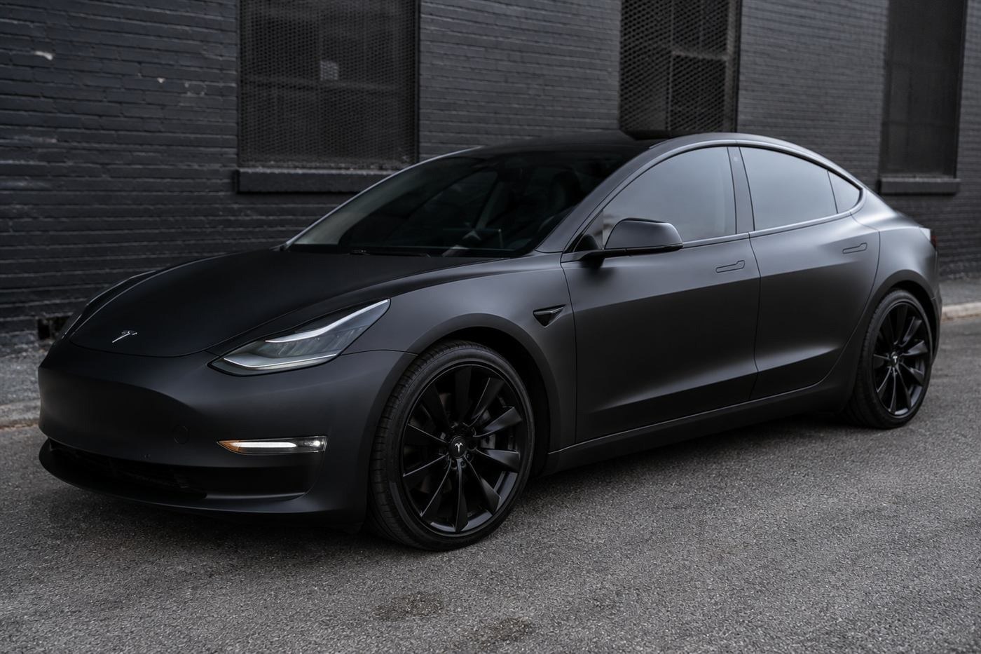 Tesla Model 3 matte black full wrap by Infinity Wrap Design